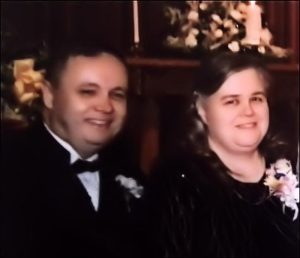 My dad and mom on my wedding day